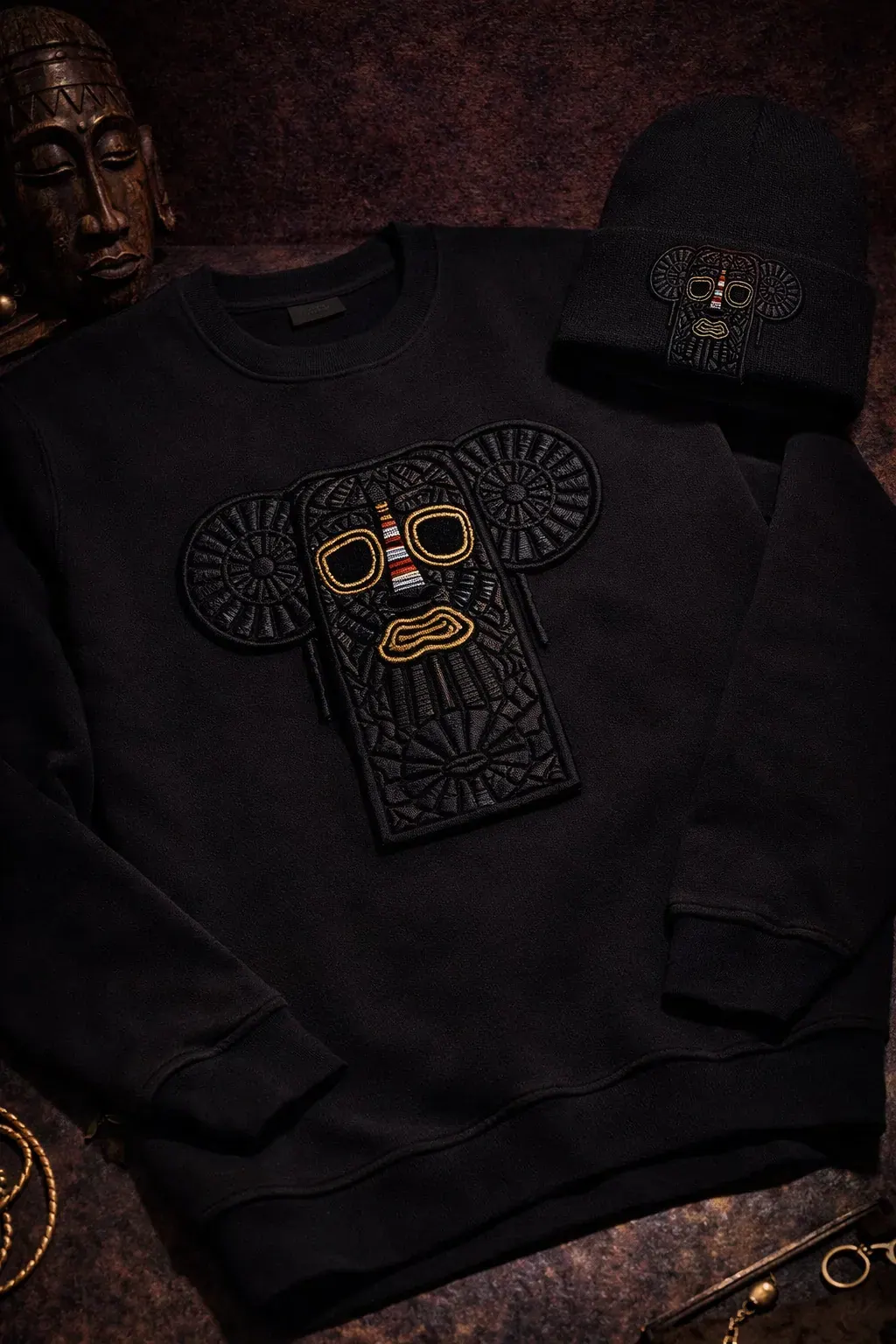 Heritage Mask crewneck with the gold and blue Sieni crest